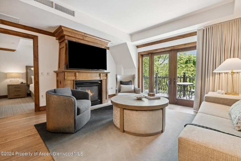 The Aspen Mountain Residences is nestled at the base of the - photo 10