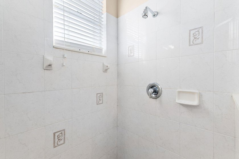 Enjoy privacy and comfort in this 3BR/2BA home with a 2-car - photo 15