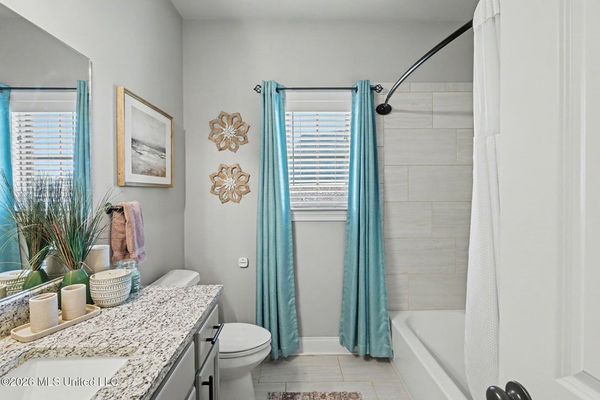 This Southaven showstopper offers beautiful water views right - photo 24