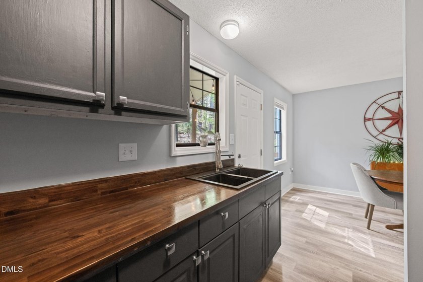 Welcome to this charming end-unit townhome in the desirable - photo 12