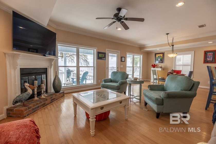 ENJOY BEAUTIFUL SUNSETS AND BAYFRONT LIVING EVERYDAY. This - photo 10