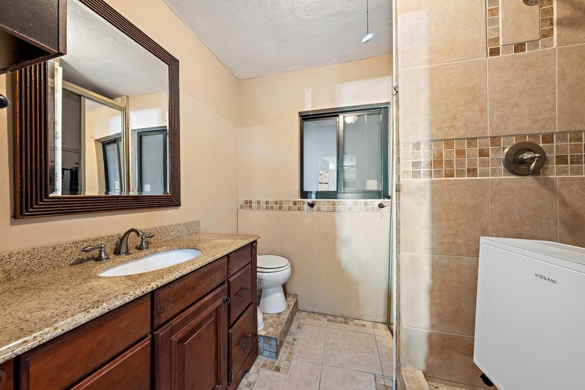 Experience refined coastal living in this beautifully renovated - photo 12