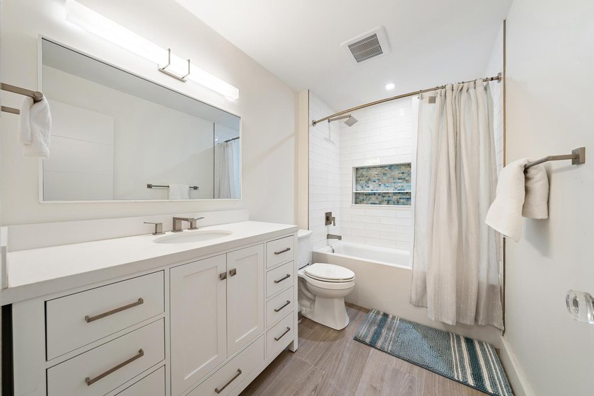 Experience refined coastal living in this beautifully renovated - photo 17
