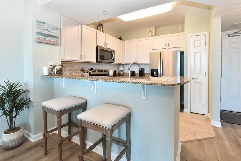 Meticulously maintained 2-bedroom junior suite at the highly - photo 4