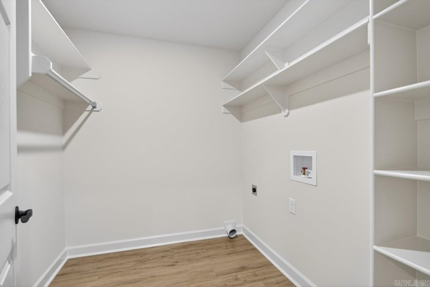 WOW! New Construction! Very pretty white siding w/white brick! - photo 16