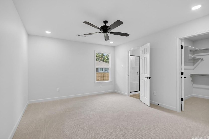 WOW! New Construction! Very pretty white siding w/white brick! - photo 17