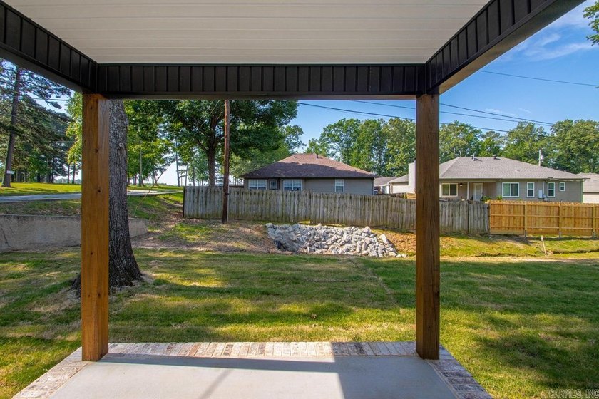 WOW! New Construction! Very pretty white siding w/white brick! - photo 23