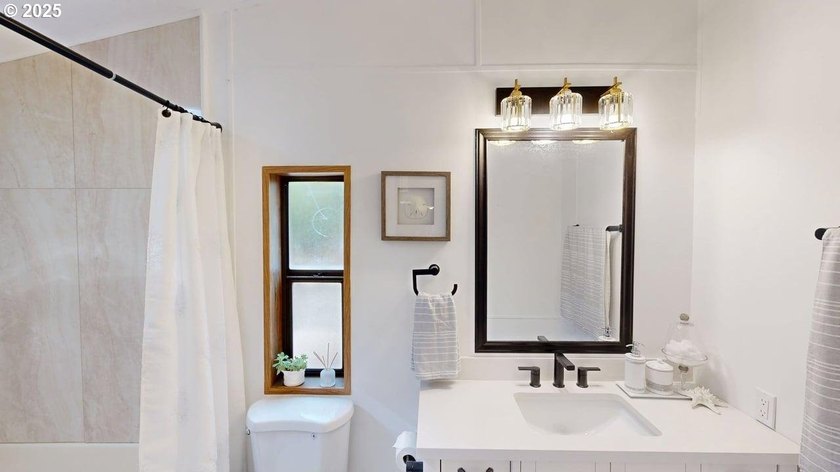 Tucked into a peaceful, wooded setting, this restored 2-bedroom - photo 13