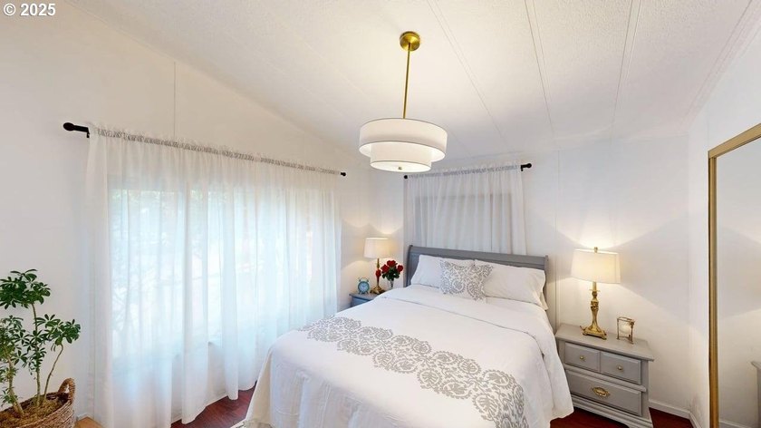 Tucked into a peaceful, wooded setting, this restored 2-bedroom - photo 16