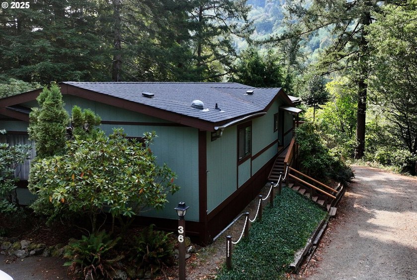 Tucked into a peaceful, wooded setting, this restored 2-bedroom - photo 26