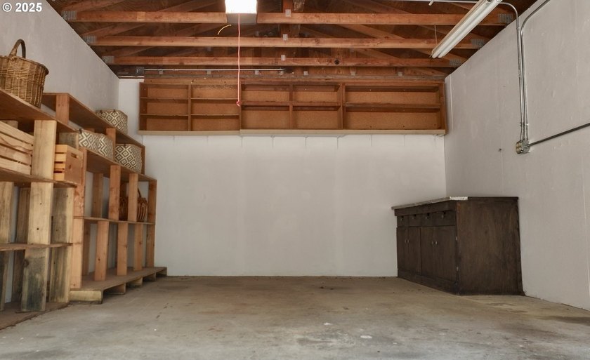 Tucked into a peaceful, wooded setting, this restored 2-bedroom - photo 29