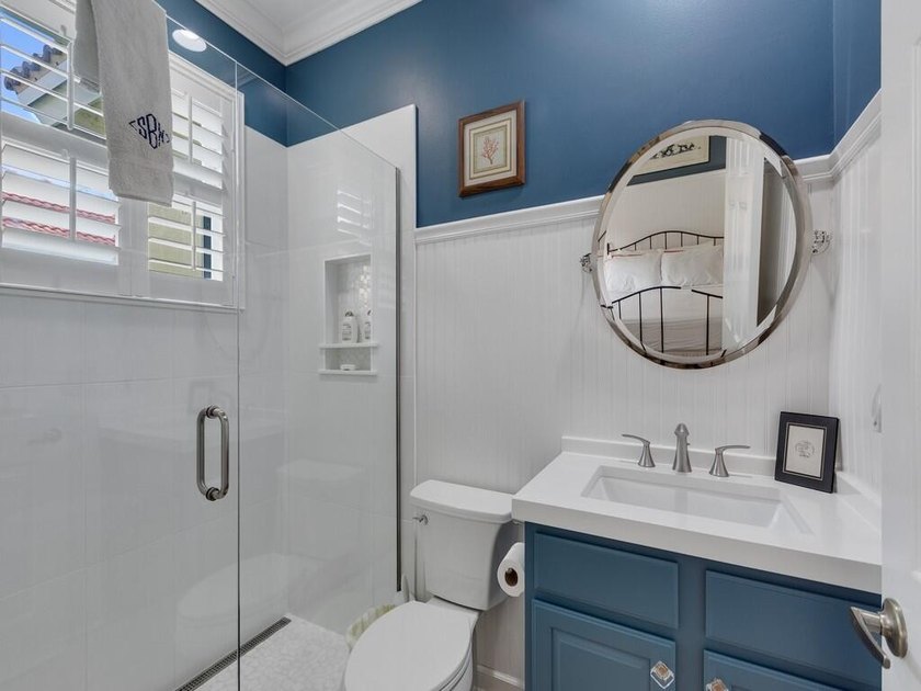 This pool home features a 2022 roof, laminate flooring - photo 29