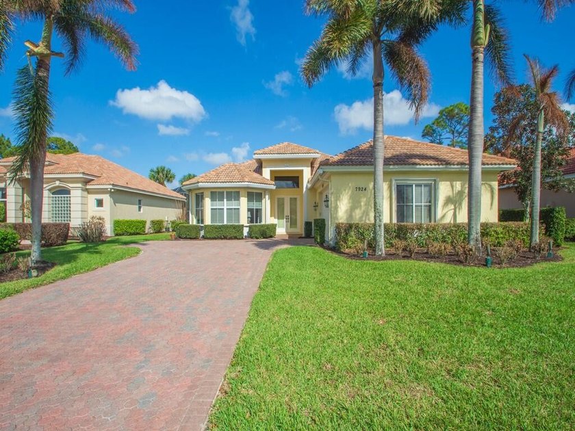 This pool home features a 2022 roof, laminate flooring - photo 32