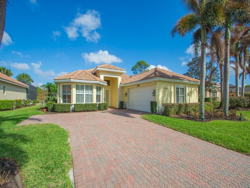 This pool home features a 2022 roof, laminate flooring - photo 33