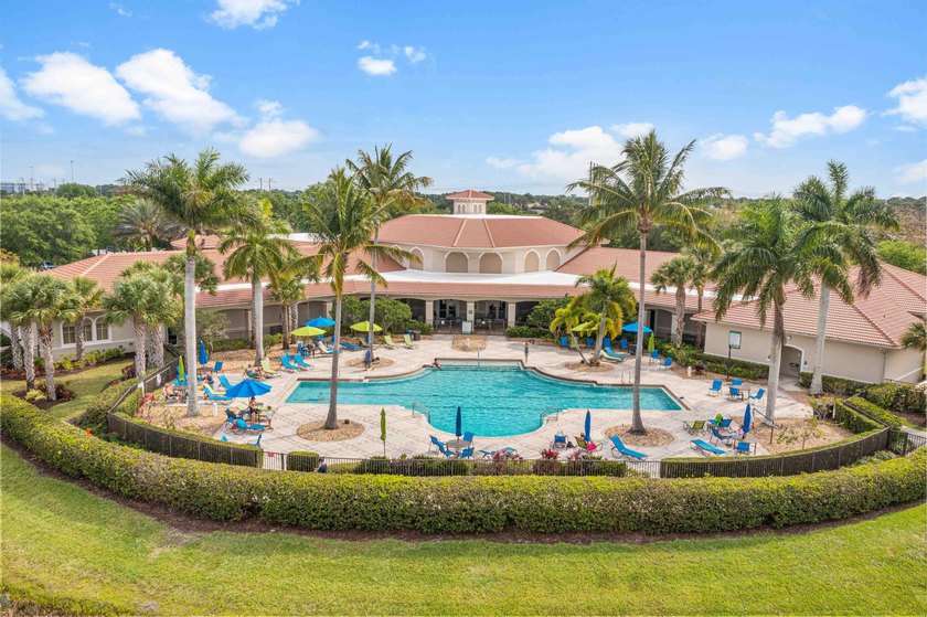 This pool home features a 2022 roof, laminate flooring - photo 39