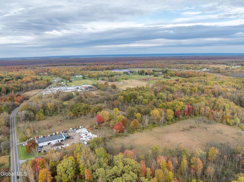 Discover 17.37 wooded acres of commercially zoned land in the - photo 11