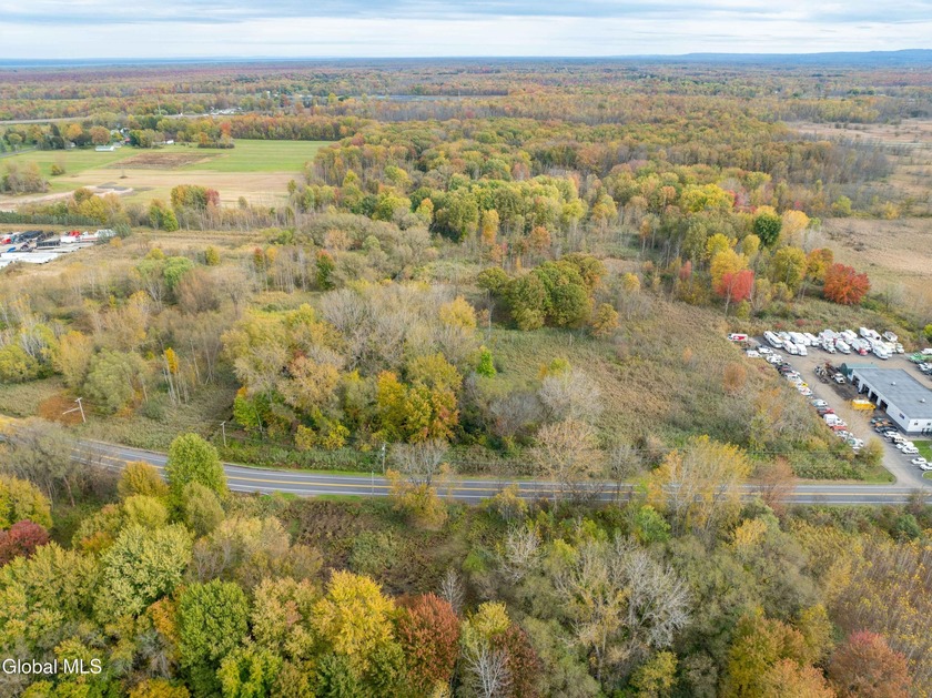 Discover 17.37 wooded acres of commercially zoned land in the - photo 21