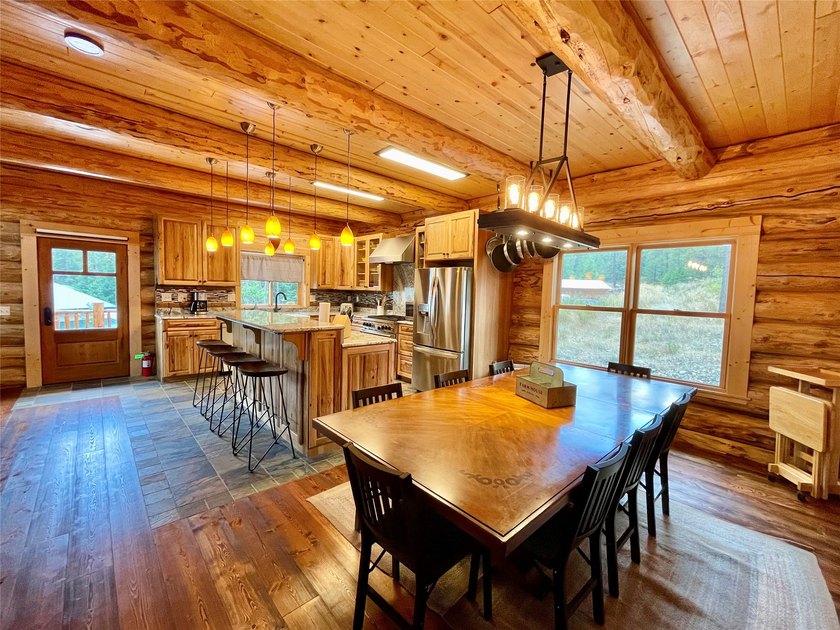 Capture the Montana dream with this stunning, hand-hewn log home - photo 18