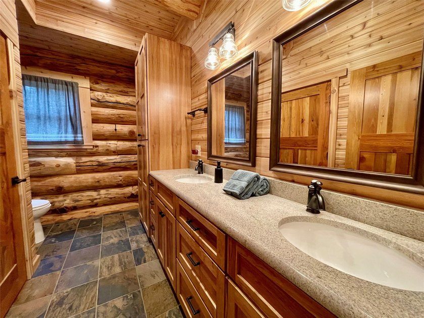 Capture the Montana dream with this stunning, hand-hewn log home - photo 22