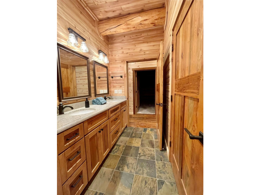 Capture the Montana dream with this stunning, hand-hewn log home - photo 23