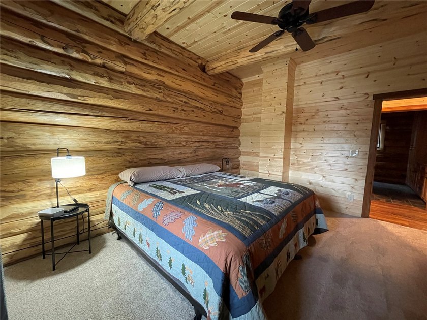 Capture the Montana dream with this stunning, hand-hewn log home - photo 25