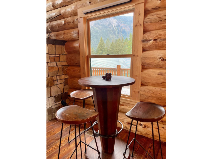 Capture the Montana dream with this stunning, hand-hewn log home - photo 30