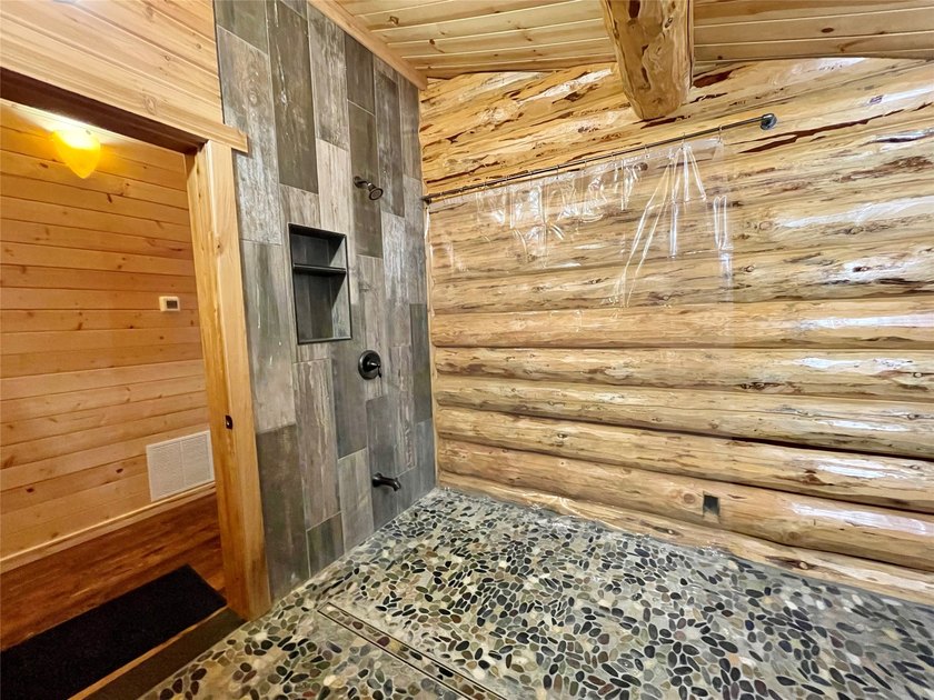 Capture the Montana dream with this stunning, hand-hewn log home - photo 37