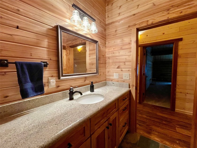 Capture the Montana dream with this stunning, hand-hewn log home - photo 40