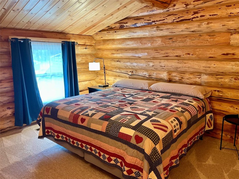 Capture the Montana dream with this stunning, hand-hewn log home - photo 42