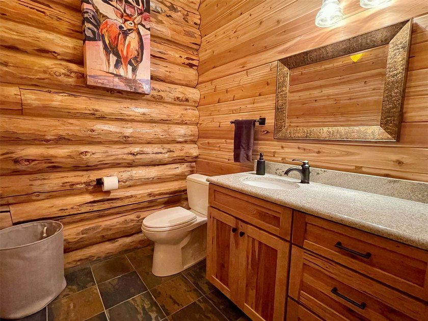 Capture the Montana dream with this stunning, hand-hewn log home - photo 43