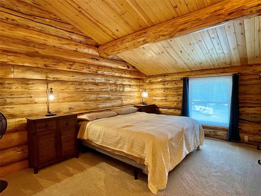 Capture the Montana dream with this stunning, hand-hewn log home - photo 44