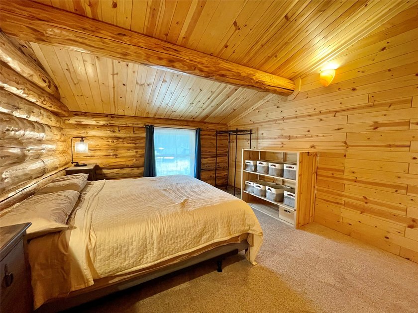 Capture the Montana dream with this stunning, hand-hewn log home - photo 45