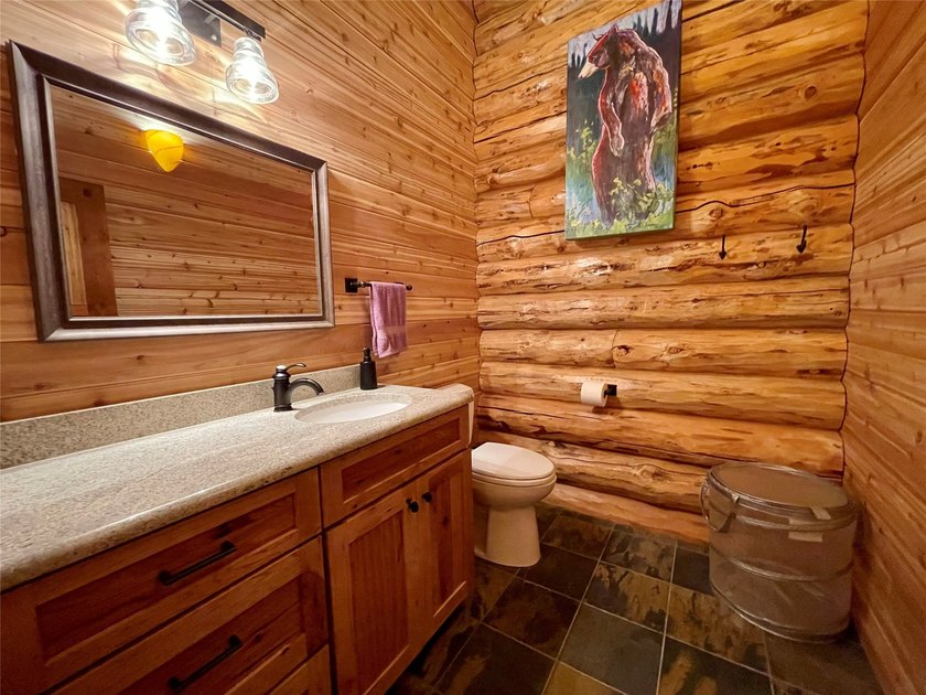 Capture the Montana dream with this stunning, hand-hewn log home - photo 46