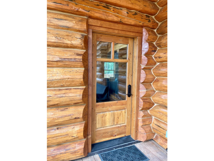 Capture the Montana dream with this stunning, hand-hewn log home - photo 57