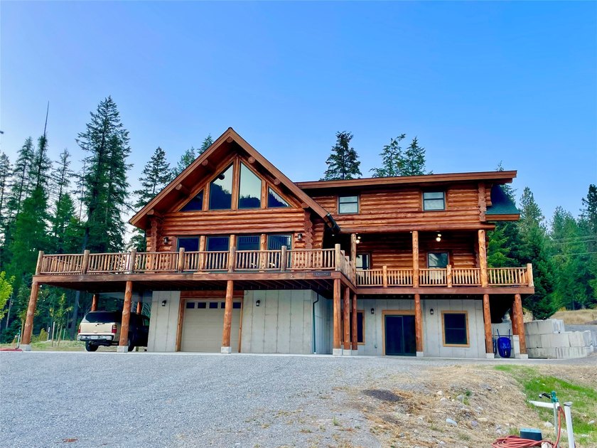 Capture the Montana dream with this stunning, hand-hewn log home - photo 59