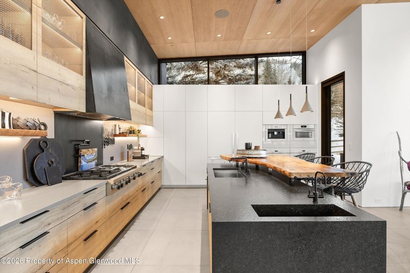 A landmark of contemporary mountain architecture, this - photo 9