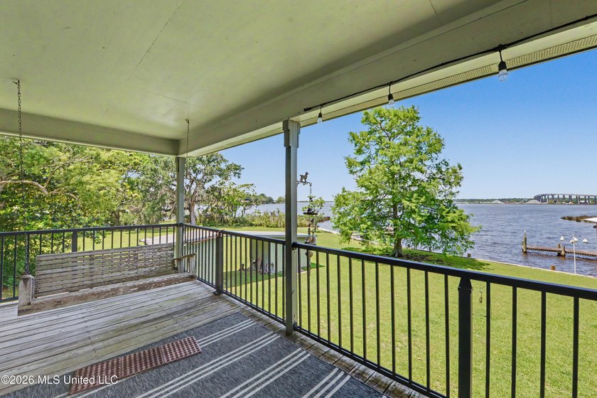 Beautiful Deep Waterfront home with a large pier and covered - photo 27