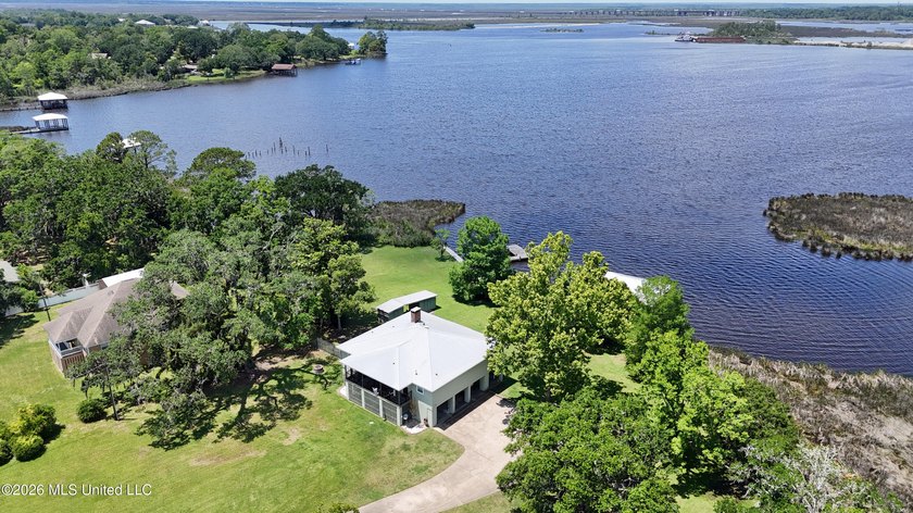 Beautiful Deep Waterfront home with a large pier and covered - photo 40