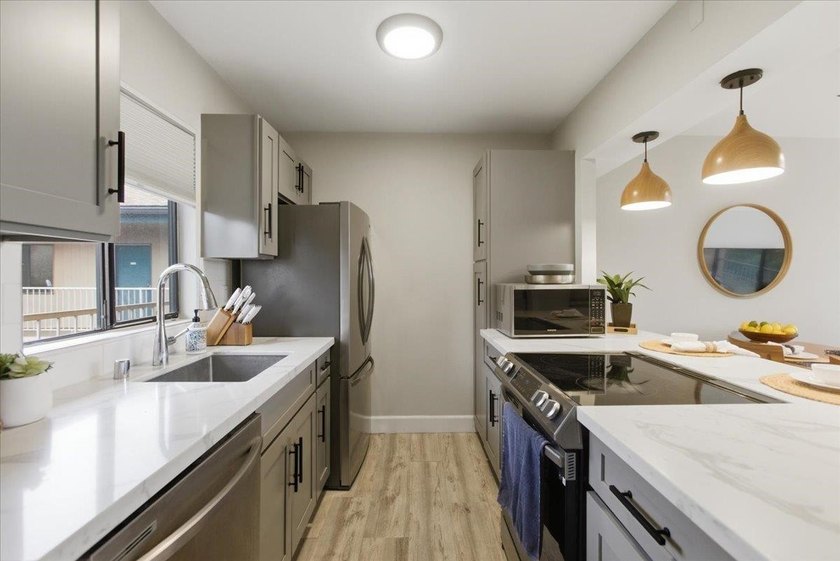 Refined island living awaits in this beautifully upgraded - photo 17