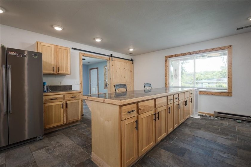 Welcome to this charming 3-bedroom, 2-bath home nestled near - photo 17