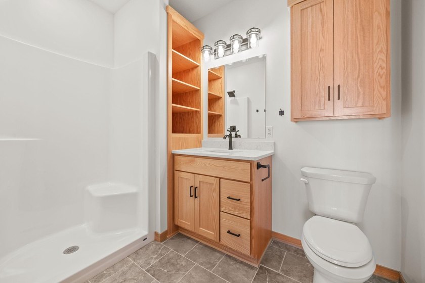 Enjoy easy, maintenance-free living in this quality-built new - photo 24