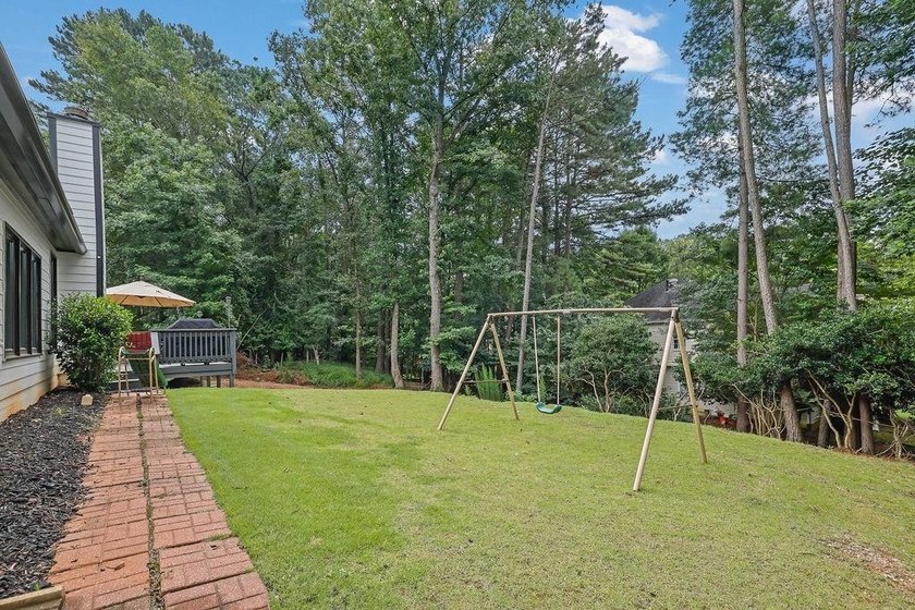 Stunning, 4BR/2BA move-in ready ranch in Roswell's highly - photo 37