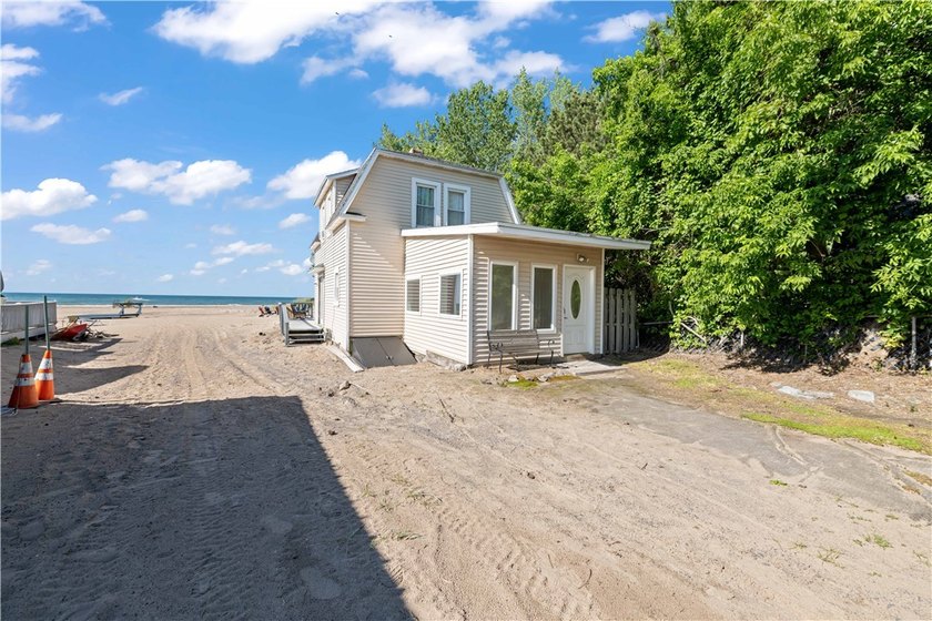 Experience waterfront living at its finest in this stunning - photo 2