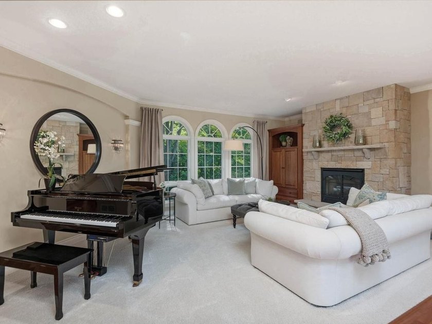 Nestled among mature trees on 2.97 acres in Corcoran's Windmill - photo 12