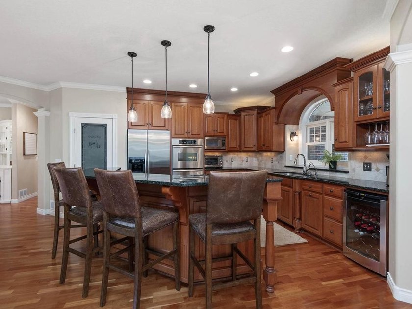 Nestled among mature trees on 2.97 acres in Corcoran's Windmill - photo 15