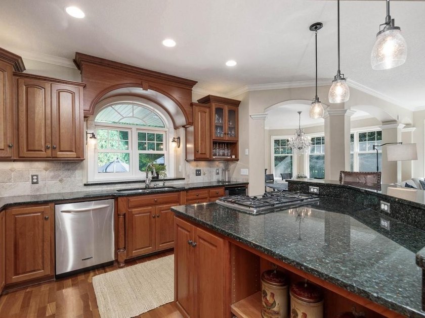 Nestled among mature trees on 2.97 acres in Corcoran's Windmill - photo 17