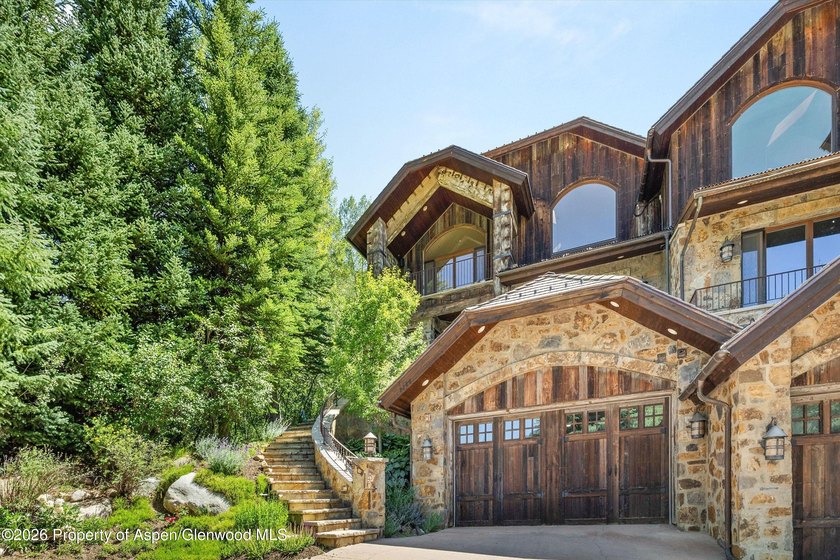 Nestled among a serene grove of mature aspens in one of Aspen's - photo 4