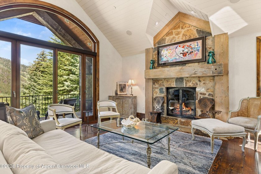 Nestled among a serene grove of mature aspens in one of Aspen's - photo 5