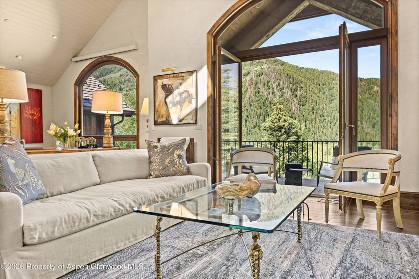 Nestled among a serene grove of mature aspens in one of Aspen's - photo 7