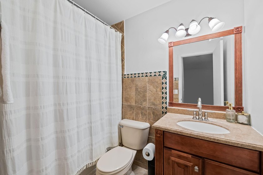 Nestled in the heart of Boca Raton, this two story townhome on a - photo 11
